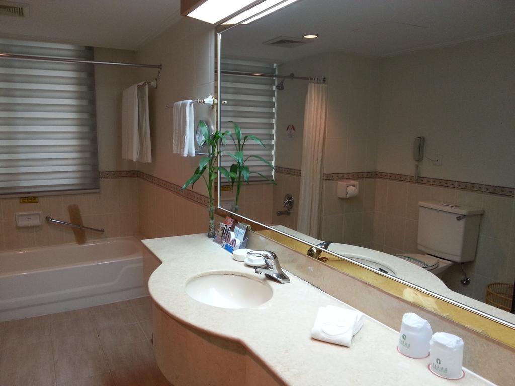 Guoxi Hotel Sanya Quarto foto